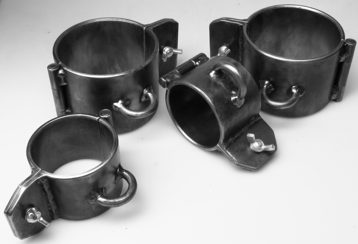 Die Fetten als Set - Stahlfesseln in Extra-Breit - Fuss + Hand